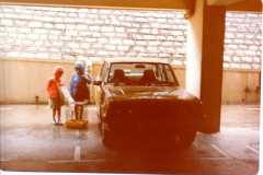 Hong-Kong-hired-car-in-underground-car-park-with-budgie-in-cage384