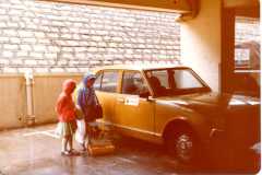 Hong-Kong-hired-car-in-underground-car-park-with-budgie-in-cage385
